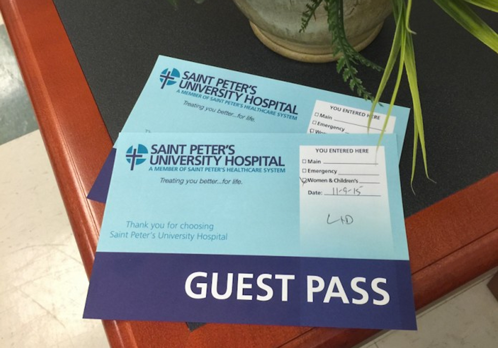 Two hospital guest badges