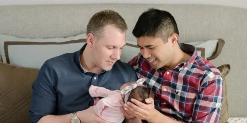 Couple with their newborn daughter