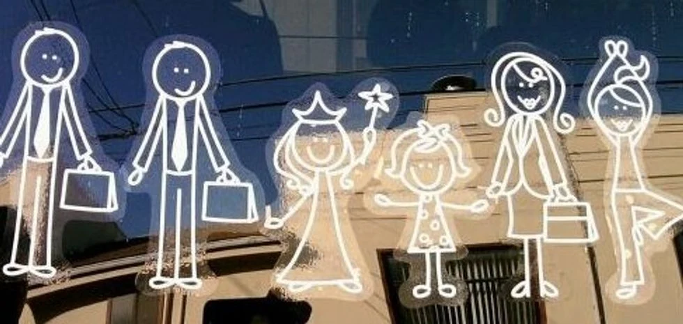 Car window decal of stick people with two moms, two dads and two daugters