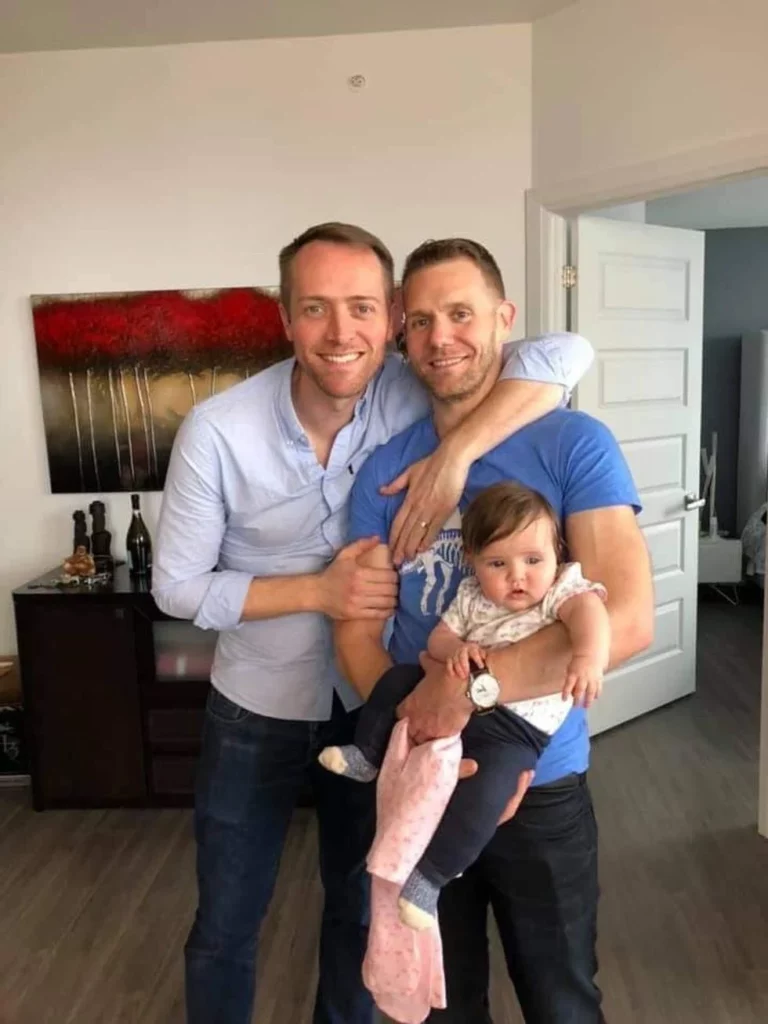 gay couple with their daughter