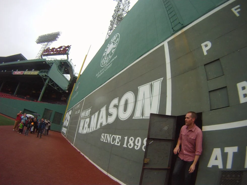 Man coming out of the Green Monster at Fewnay Park for surprise proposal