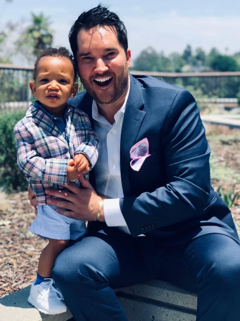 Father and toddler dressed up in blazers