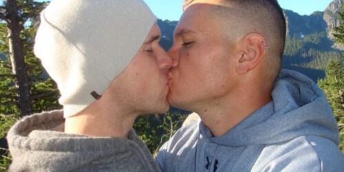 gay couple kissing on Mount Rainier