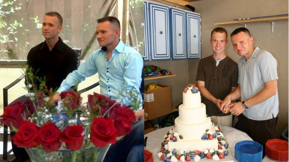 Gay couple cutting wedding cake