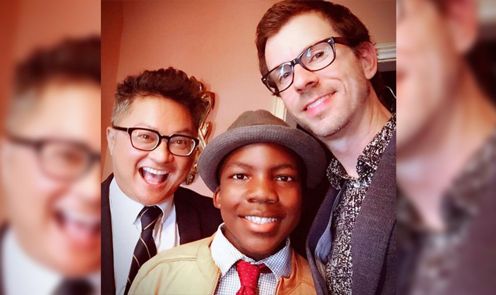 Alec Mapa and Jamie Hebert with their son