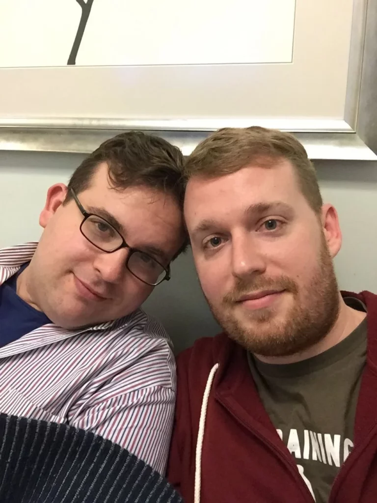 Two men waiting at hospital for baby to be born