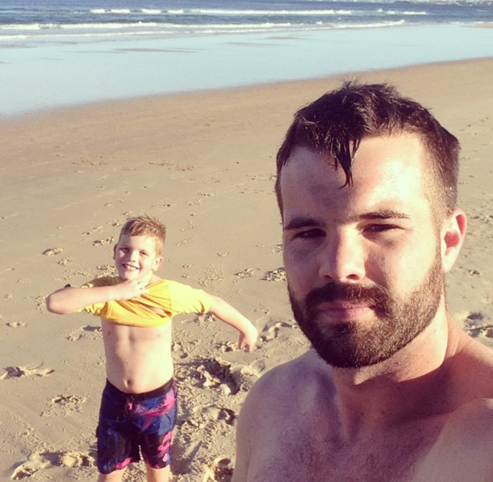 Uncle with his nephew on the beach