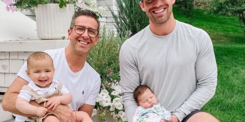 Two gay dads and their two babies